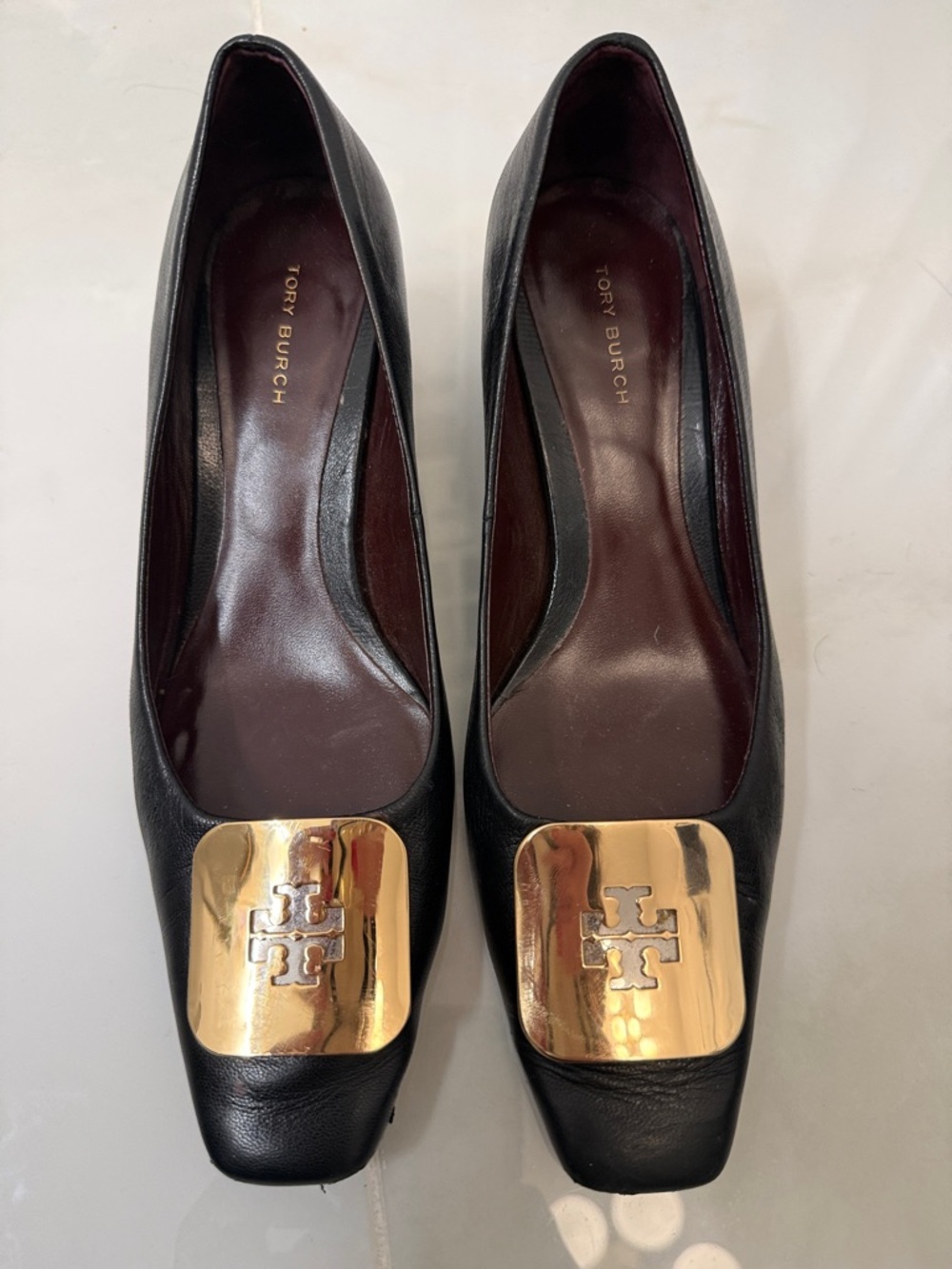 Tory Burch Black Leather Wedges with Gold Logo Plaques